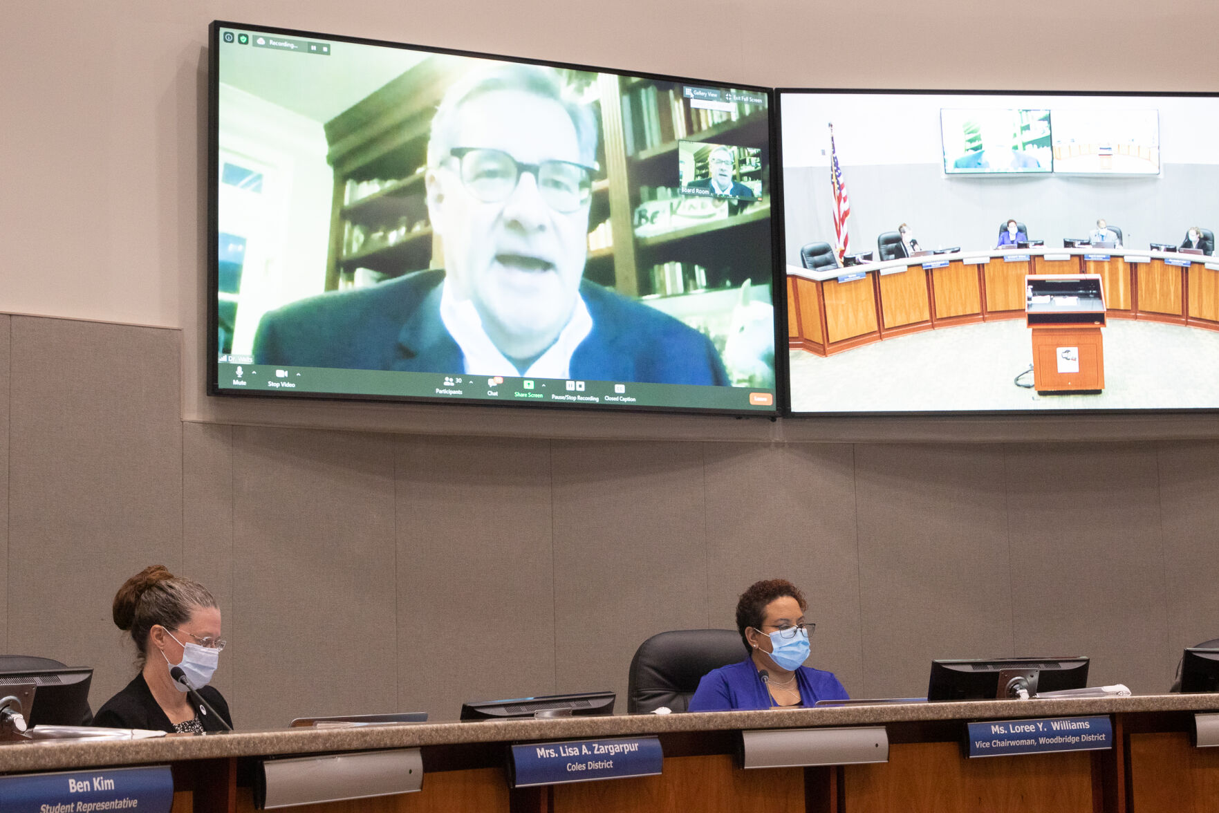 Photo_News_SPEDTeacherRally_Walts on screen.jpg